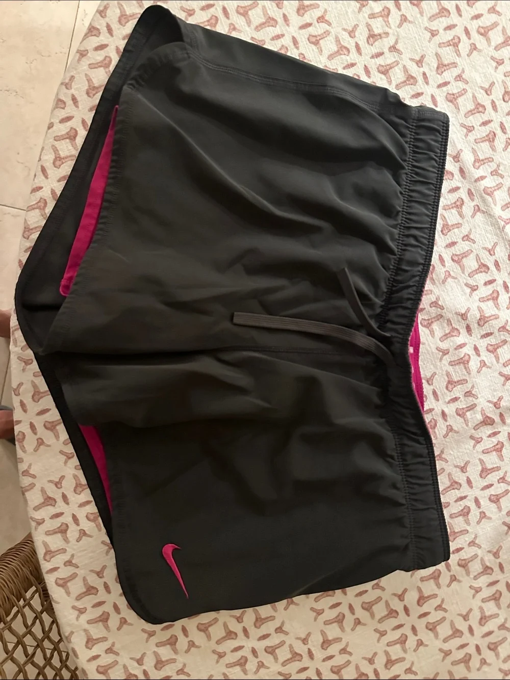 Nike Women’s Black Athletic Shorts with built in pink under shorts.